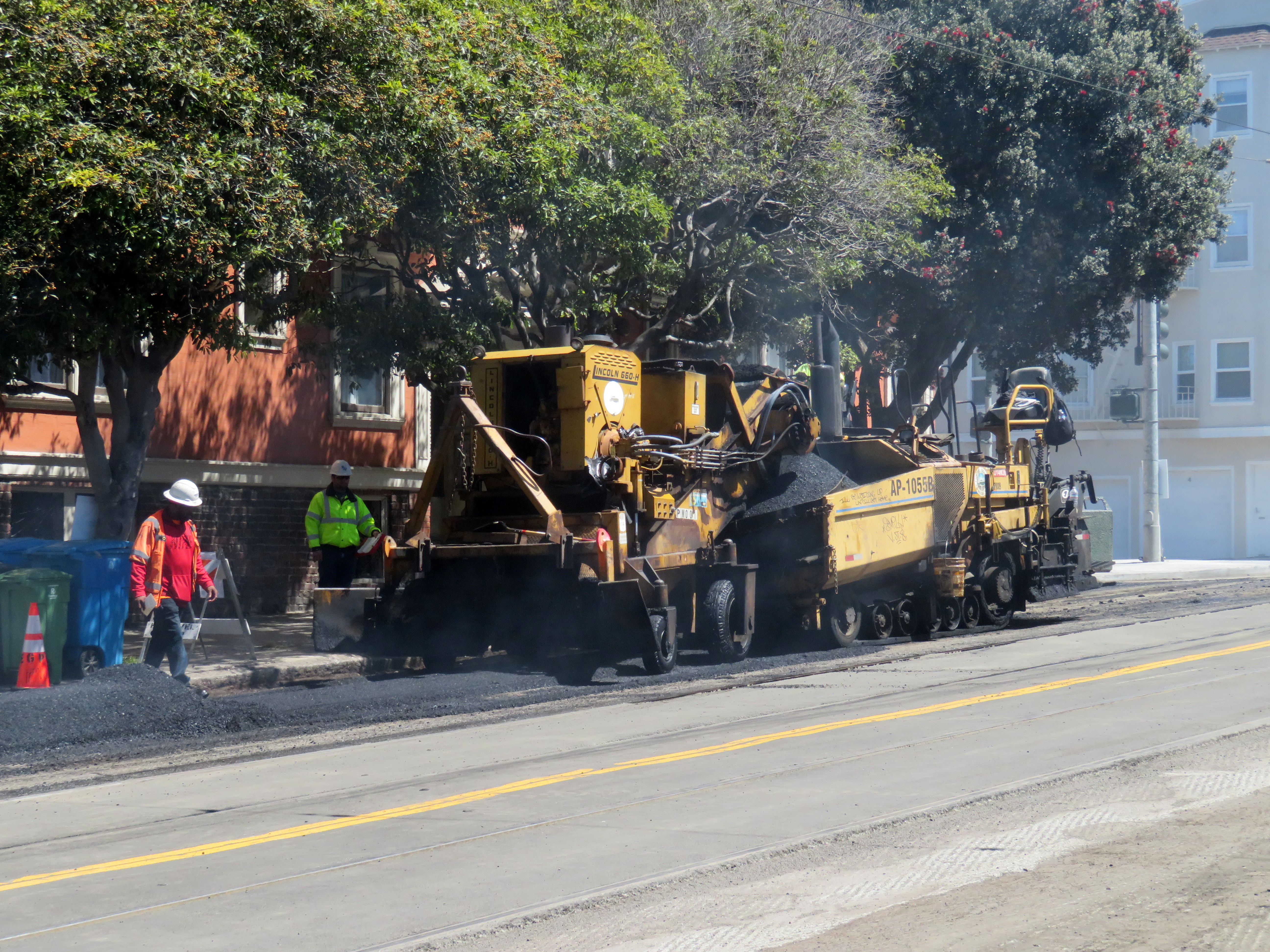 Paving machine working on Irving Street in San Francisco (stock photo)